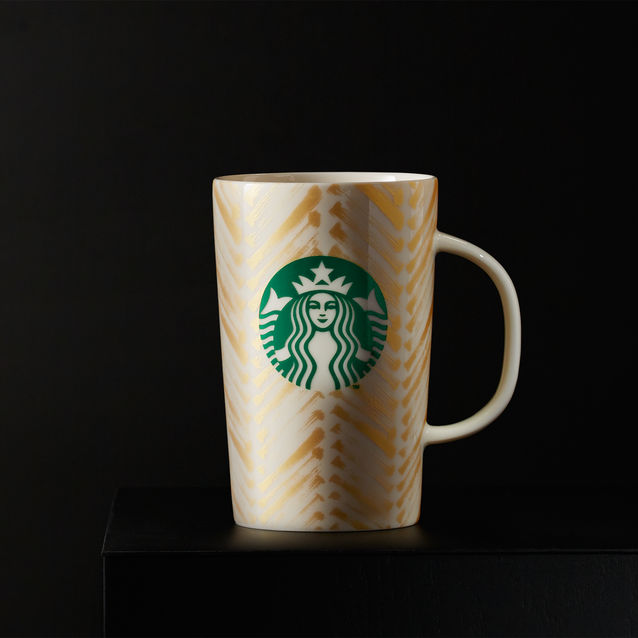 mug doré avec logo sirène starbucks coffee